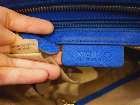 where does michael kors romy bag go|Michael Kors purse serial number.